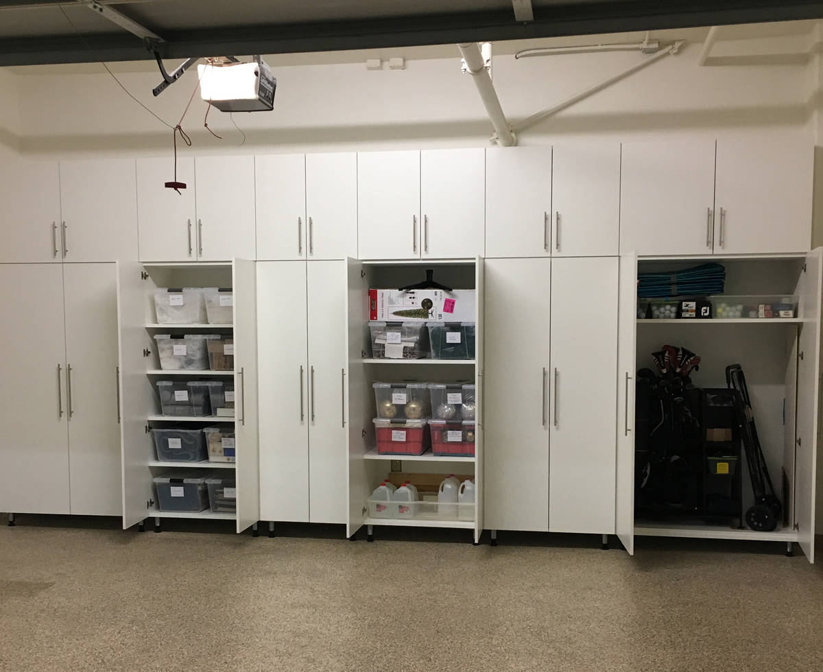 Cabinets add a touch of class to your garage along with additional storage space. (Custom Garag ...