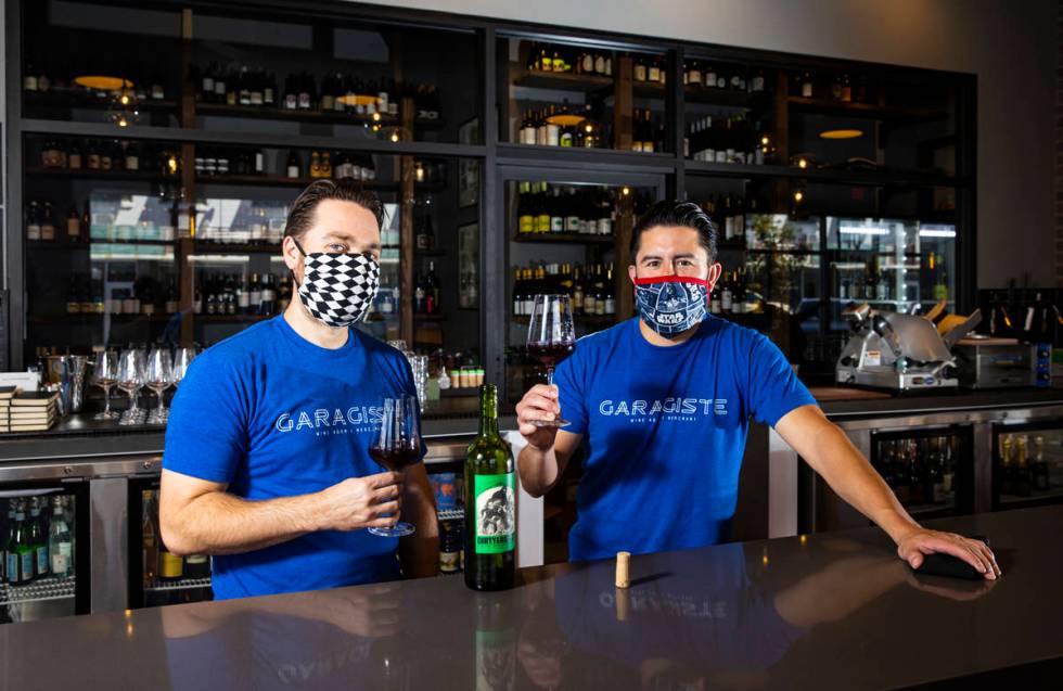 Eric Prato, left, and Mario Enriquez, founders of Garagiste Wine Room & Merchant in the Arts Di ...