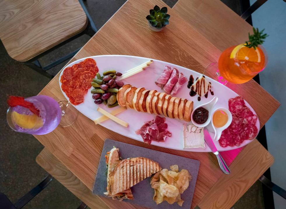 The Local serves a limited menu, which includes meet and cheese trays, along with wine, cocktai ...