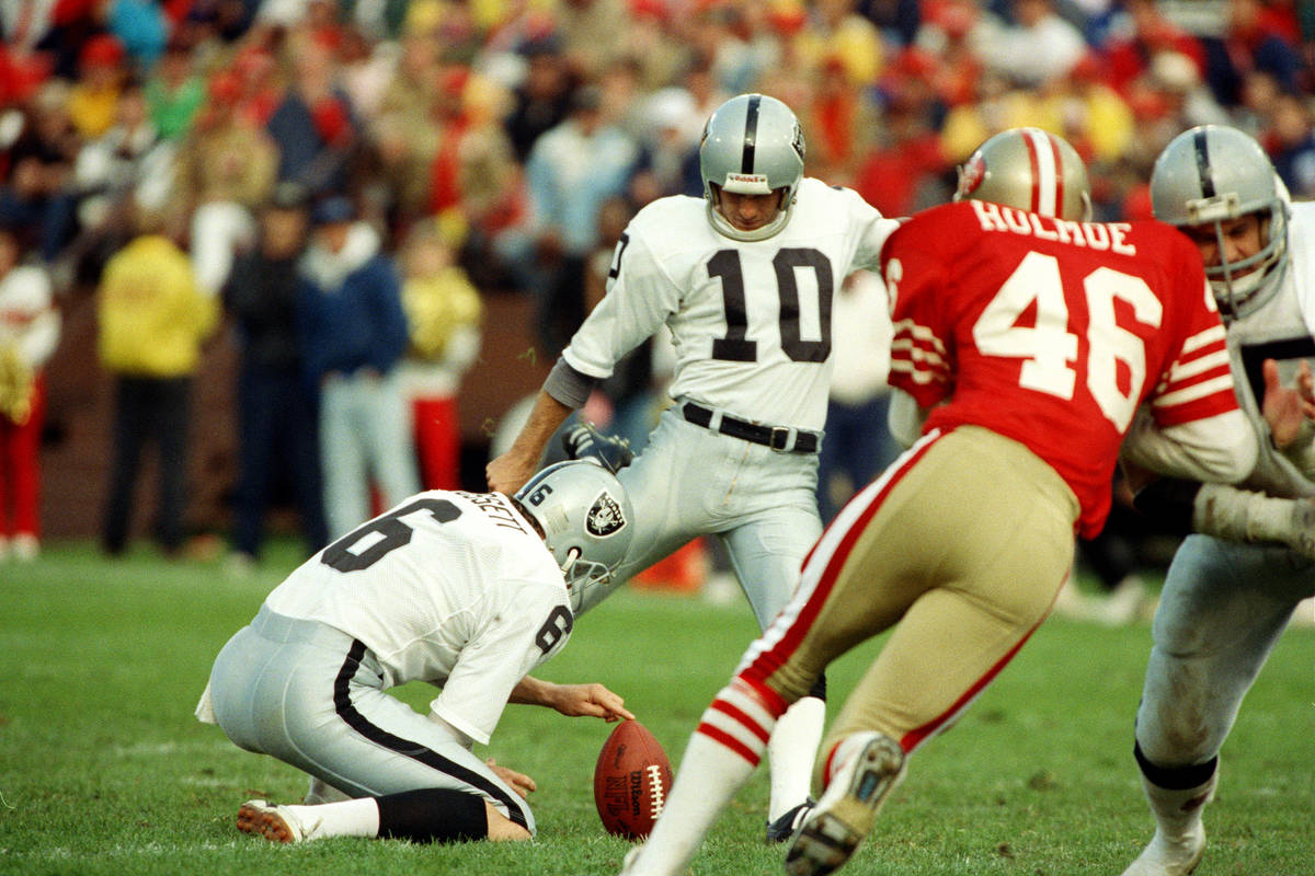 Los Angeles Raiders kicker Chris Bahr kicks the second of three field goals in the Raiders 9-3 ...