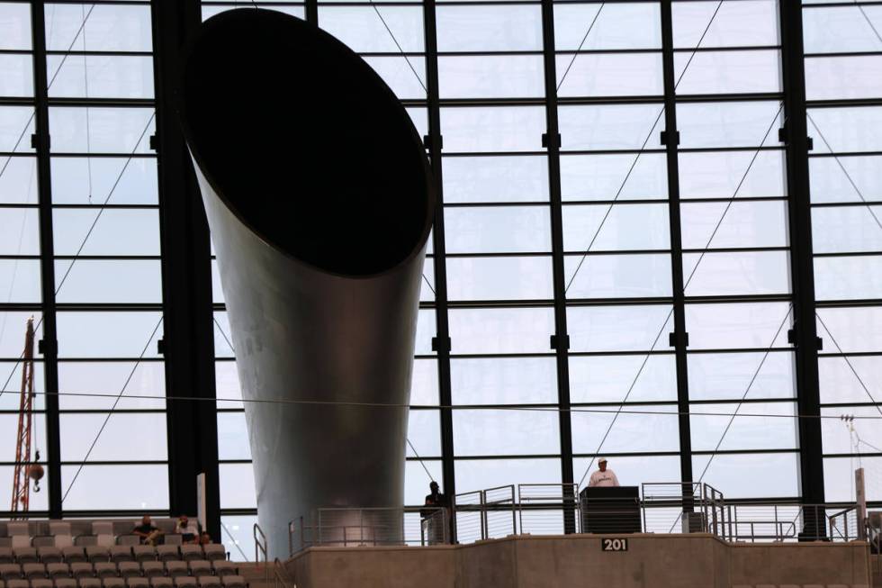 Las Vegas Raiders owner Mark Davis, in white, addresses the team near the Al Davis Memorial Tor ...