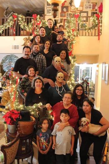 An undated photo of Maria Urrabazo, wearing a red shirt in the center, with her family. Urrabaz ...