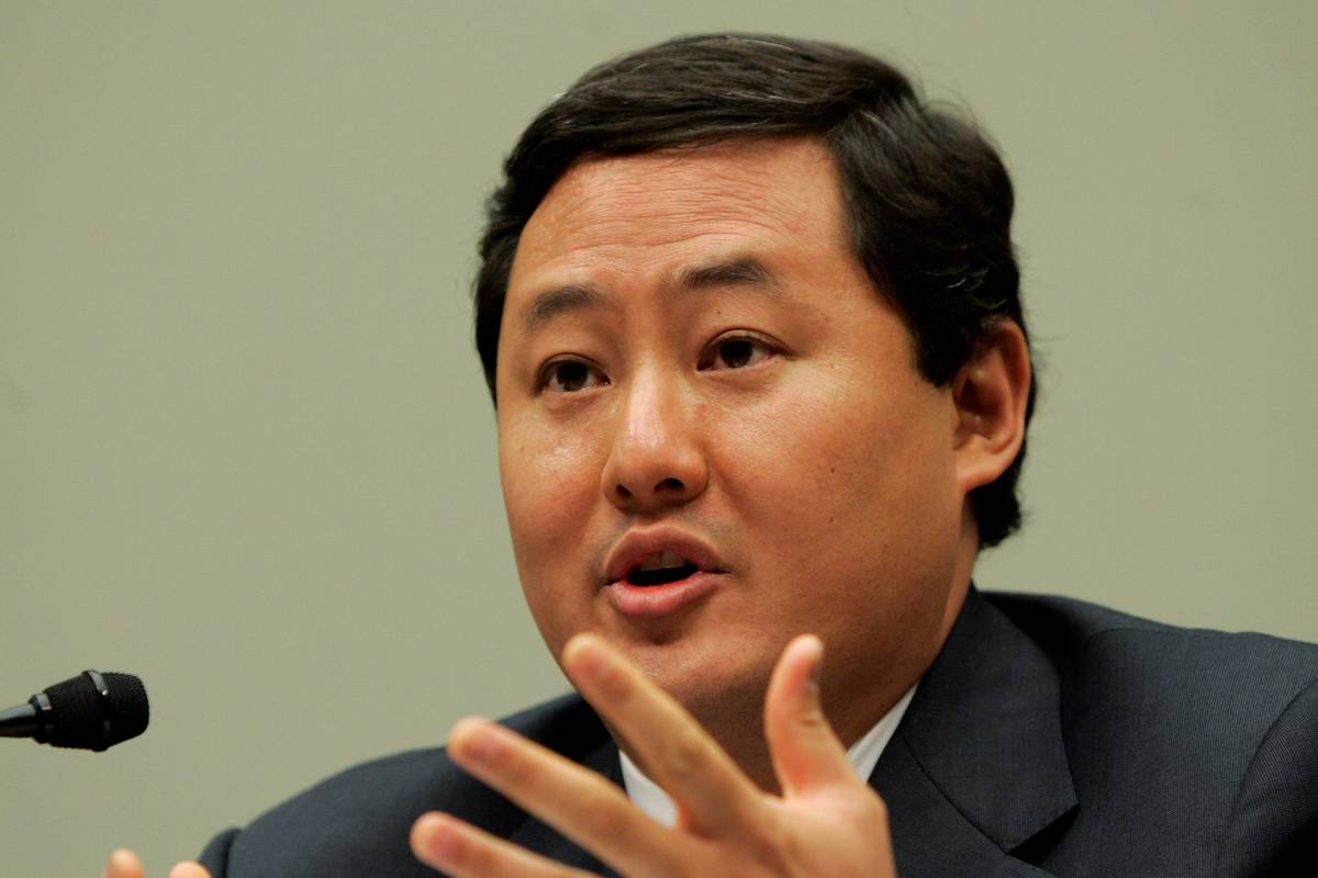 John Yoo, a law professor at the University of California at Berkeley, testifies on Capitol Hil ...
