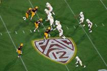 FILE - This Thursday, Aug. 29, 2019, file photo, shows the Pac-12 logo during the second half o ...