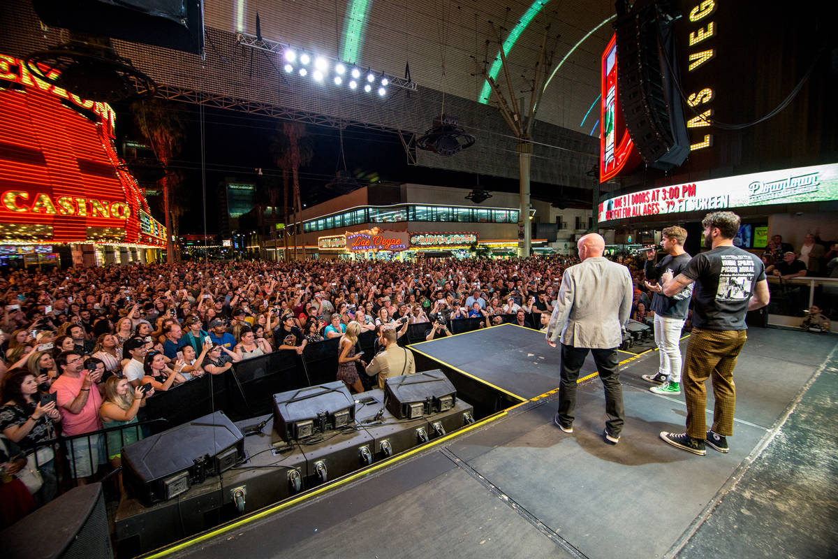 Fremont Street Experience President Patrick Hughes is shown with the Chainsmokers on 3rd Street ...
