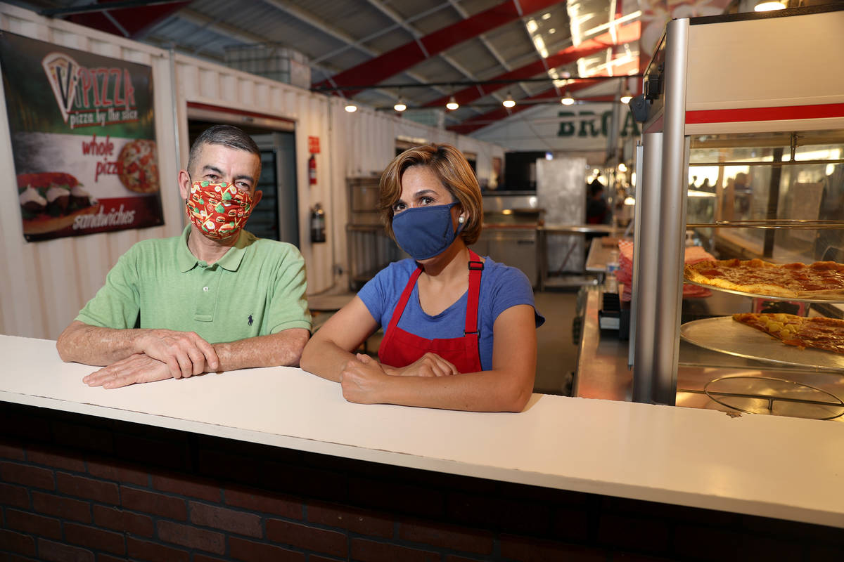 Jorge Bañuelos, left, and his wife Gaby, owners of ViPizza, at Broadacres Marketplace in North ...