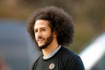 FILE - In this Nov. 16, 2019, file photo, free agent quarterback Colin Kaepernick arrives for a ...