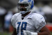 Detroit Lions defensive end Jeremiah Valoaga (78) stretches during a joint practice with the Oa ...