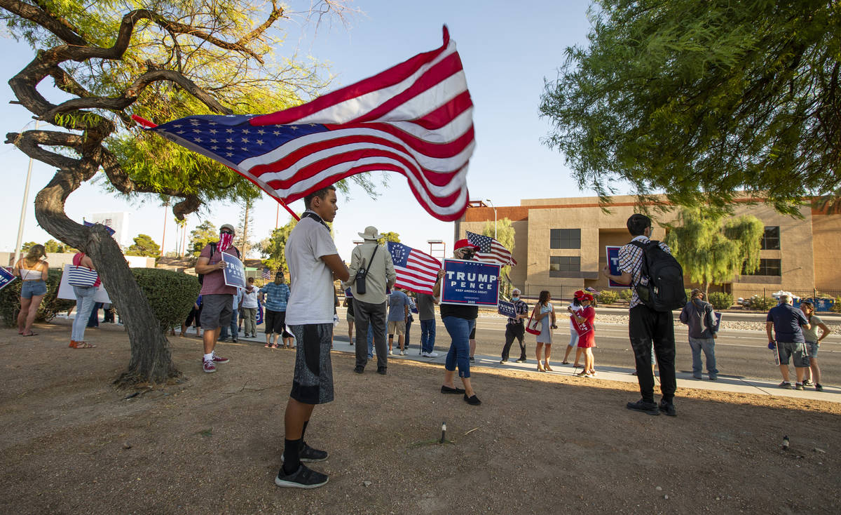Protestors gather in front of the Grant Sawyer building to voice opposition against AB4, a cont ...