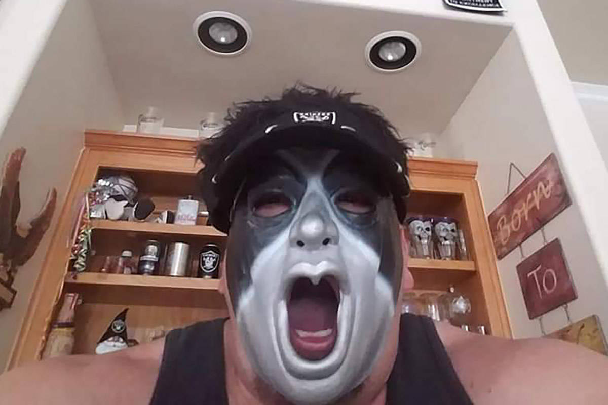 Phillip Ortiz of Albuquerque, N.M., is a diehard Raiders fan and was going to take his father t ...