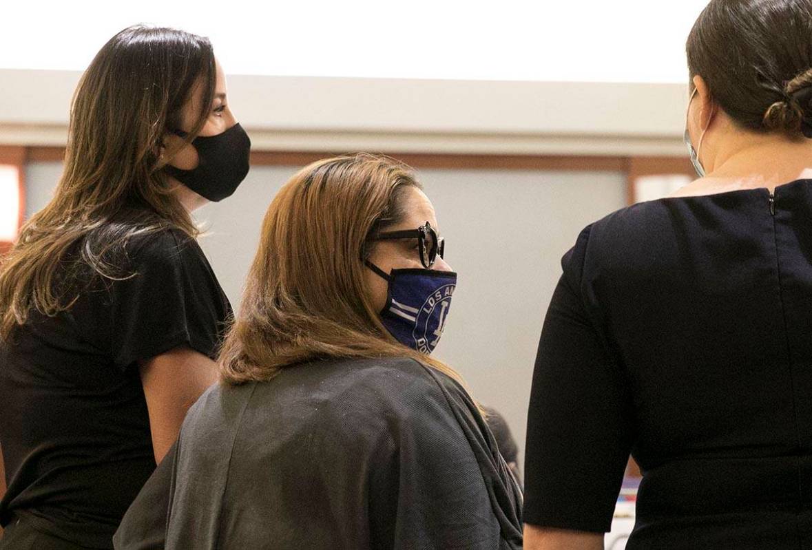 Malinda Mier, center, the co-defendant in the Alpine Apartments fire case, appears in court wit ...