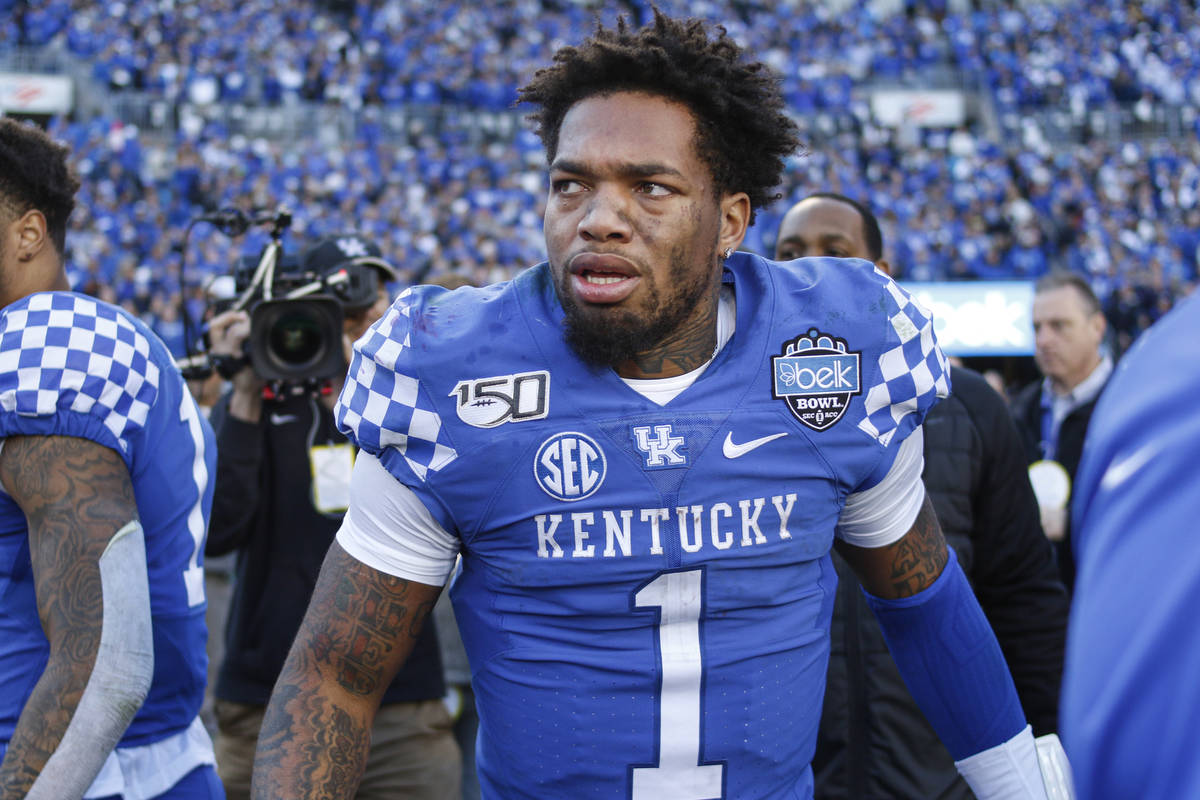 Kentucky’s Lynn Bowden Jr. stands on the field after leading his team to a 37-30 victory over ...