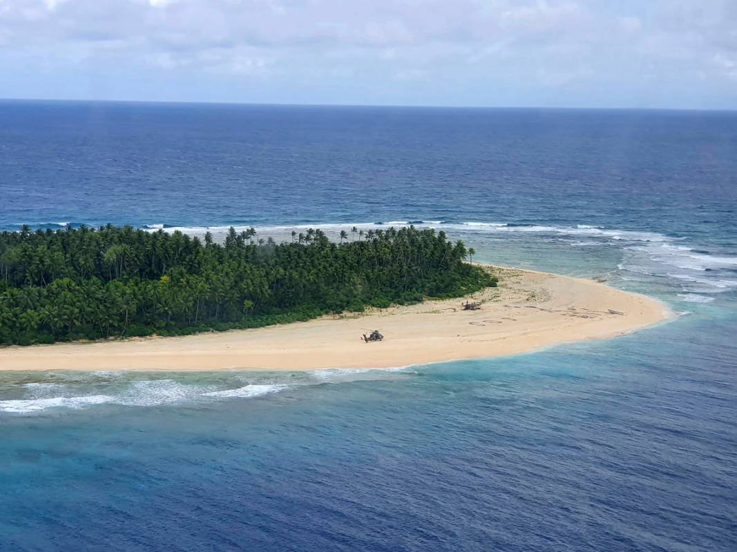 In this photo provided by the Australian Defence Force, an Australian Army helicopter lands on ...