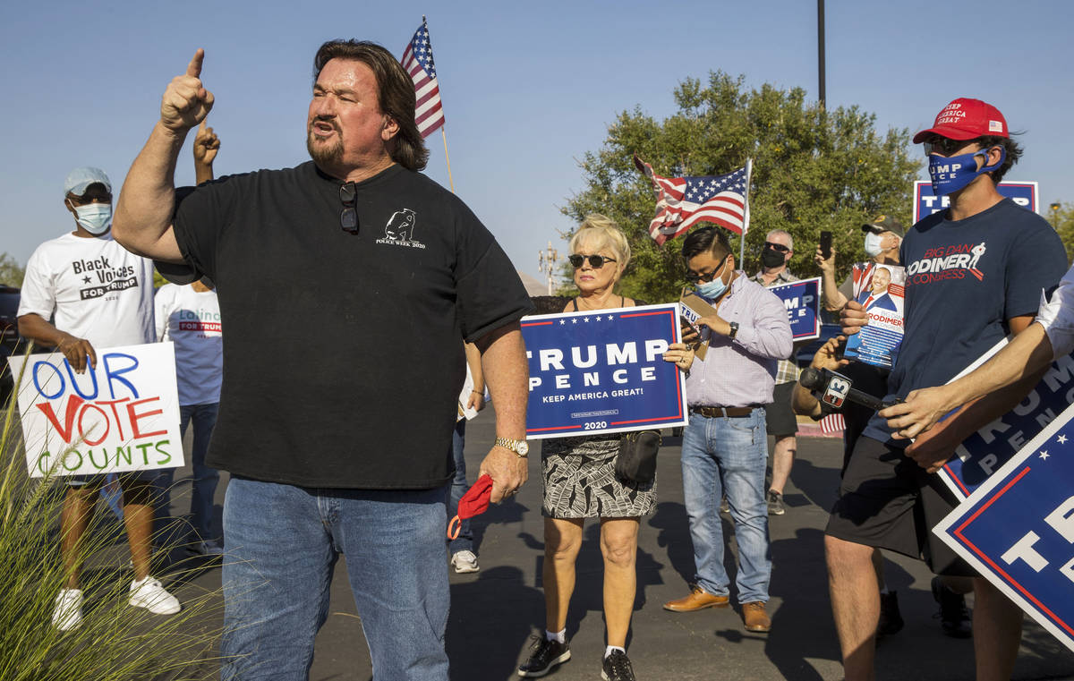 Michael McDonald fires up protestors gathered at the Grant Sawyer building to voice opposition ...