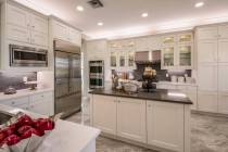 To build a kitchen island, you can buy a pair of base cabinets and screw them together to get t ...