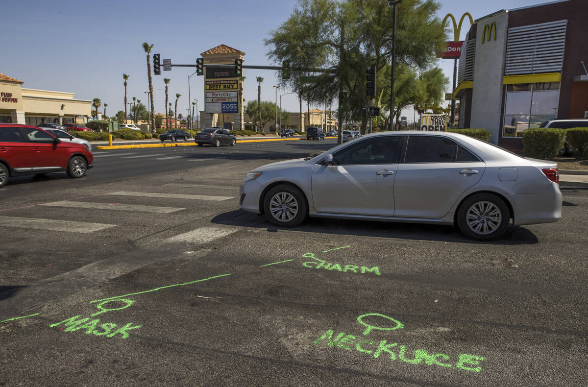 Accident markings identify evidence where two teenage girls were struck and killed by a vehicle ...