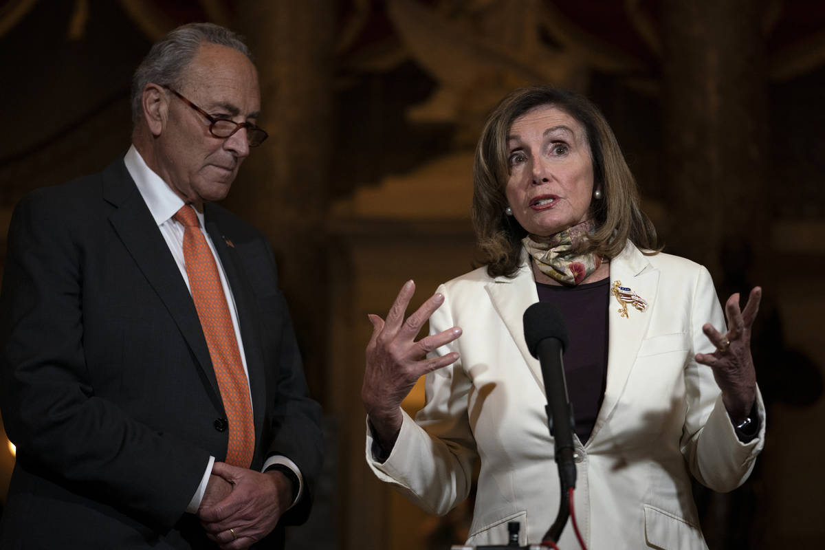 House Speaker Nancy Pelosi of Calif., and Senate Minority Leader Sen. Chuck Schumer of N.Y., sp ...