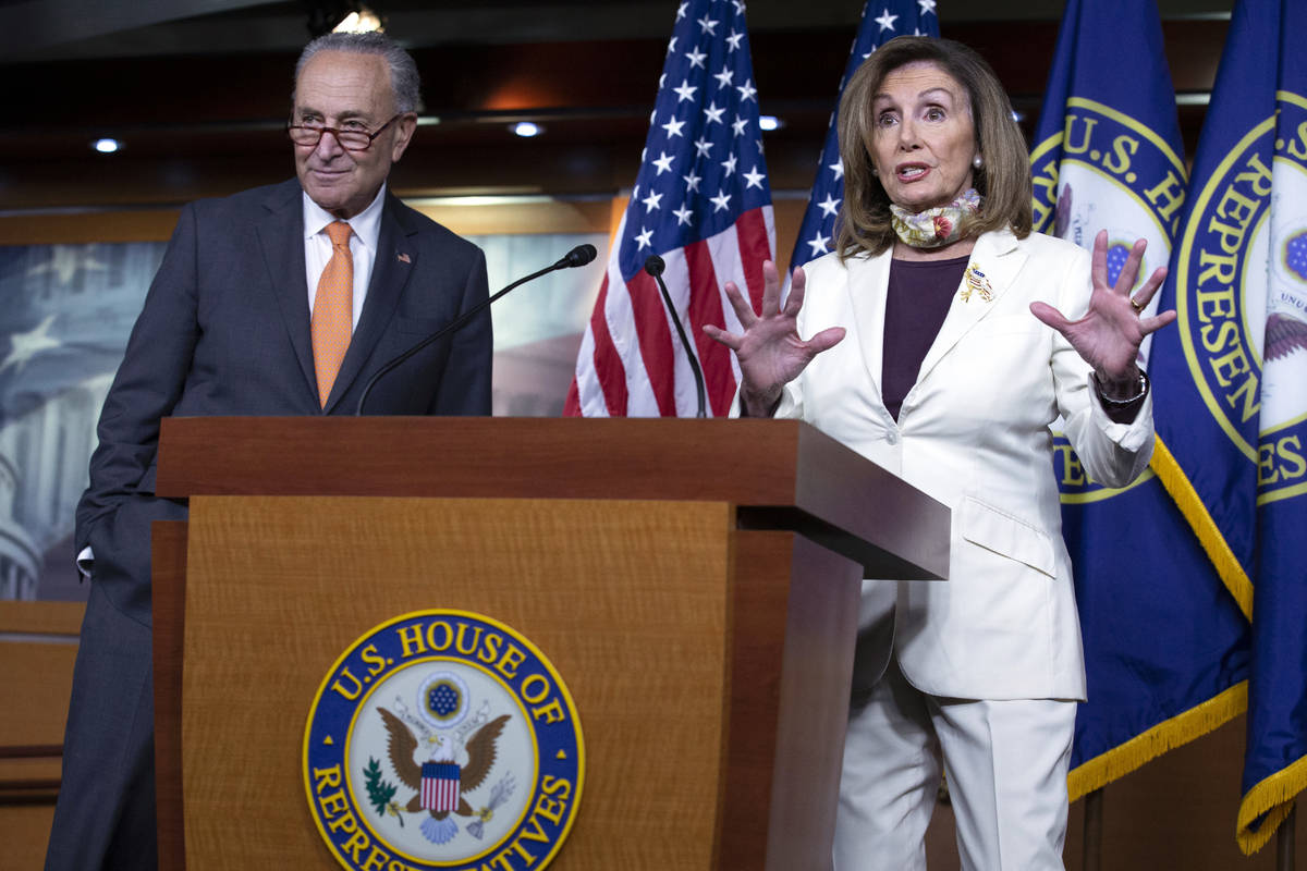 House Speaker Nancy Pelosi of Calif., joined by Senate Minority Leader Sen. Chuck Schumer of N. ...