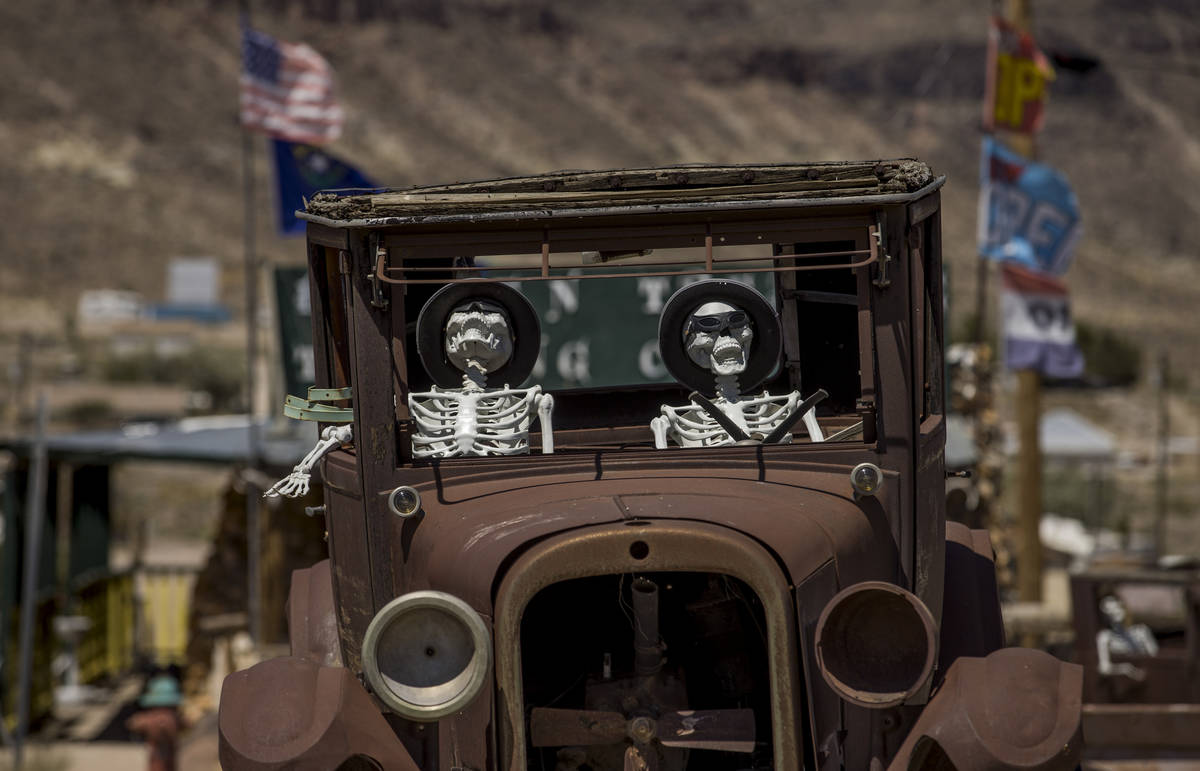 Skeletons are apart of a play on ÒMen in BlackÓ on display in front of the Hidden Tre ...
