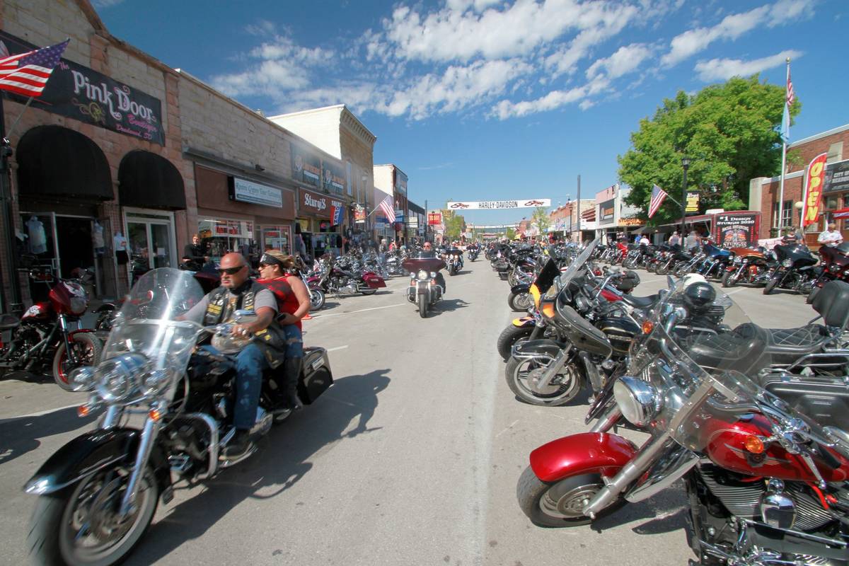 Thousands of bikers rode through the streets for the opening day of the 80th annual Sturgis Mot ...