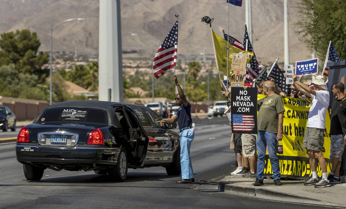 Mack Miller arrives by limo during a No Mask Nevada rally to oppose the face mask mandate and a ...