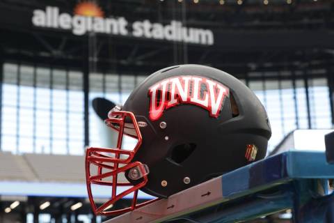 A UNLV football helmet is seen inside Allegiant Stadium, where the team will play its home game ...