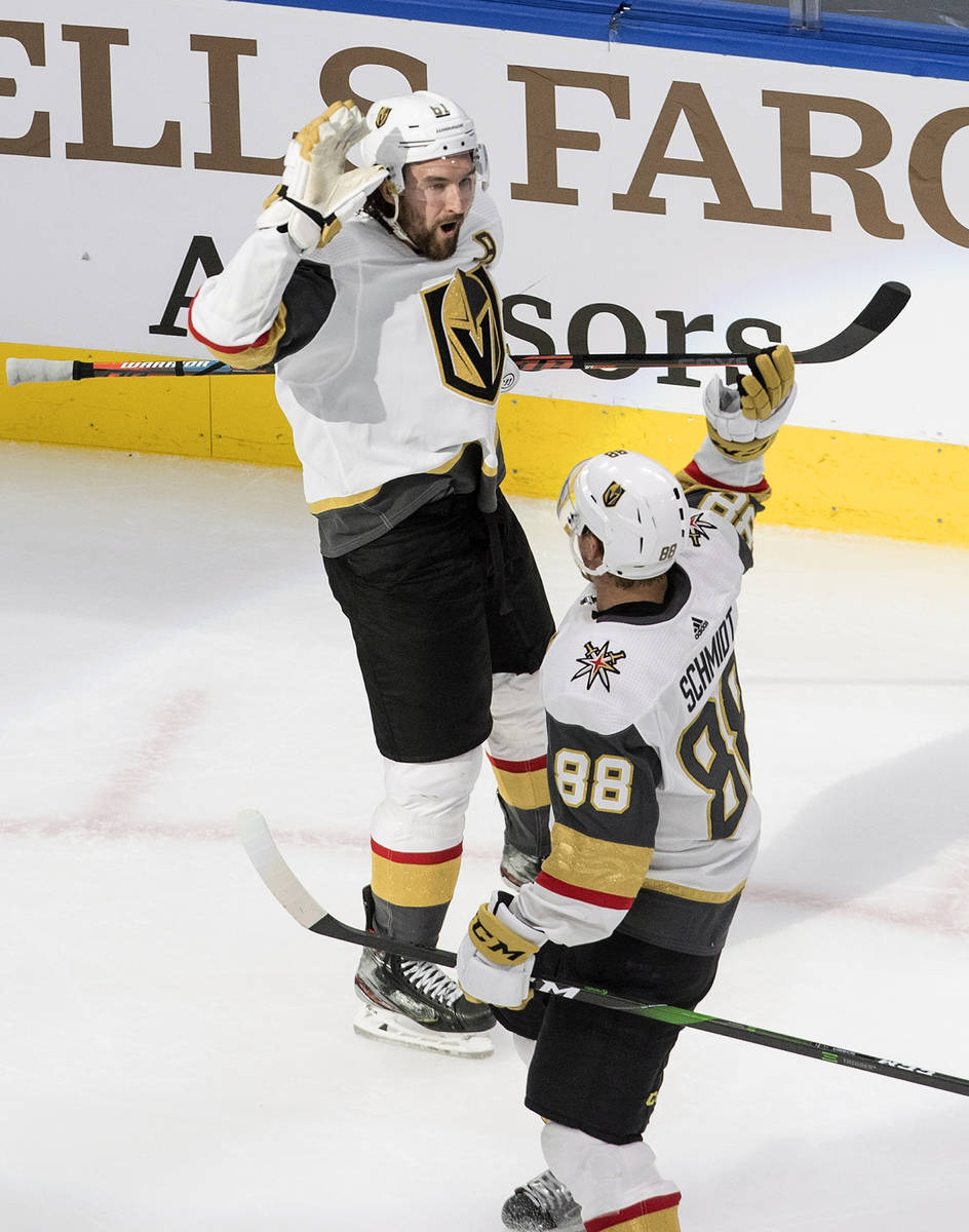 Vegas Golden Knights' Mark Stone (61) and Nate Schmidt (88) celebrate a goal against the St. Lo ...