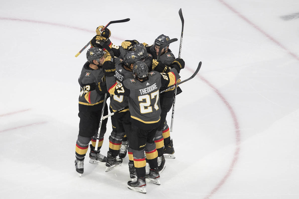 Vegas Golden Knights celebrate a goal against the Chicago Blackhawks during the second period i ...