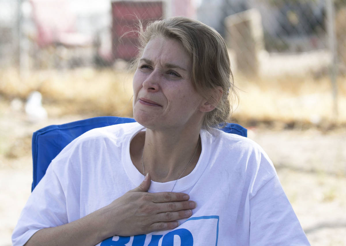 Samantha Squires pauses as she speaks about her brother, Joshua, who was killed by police after ...