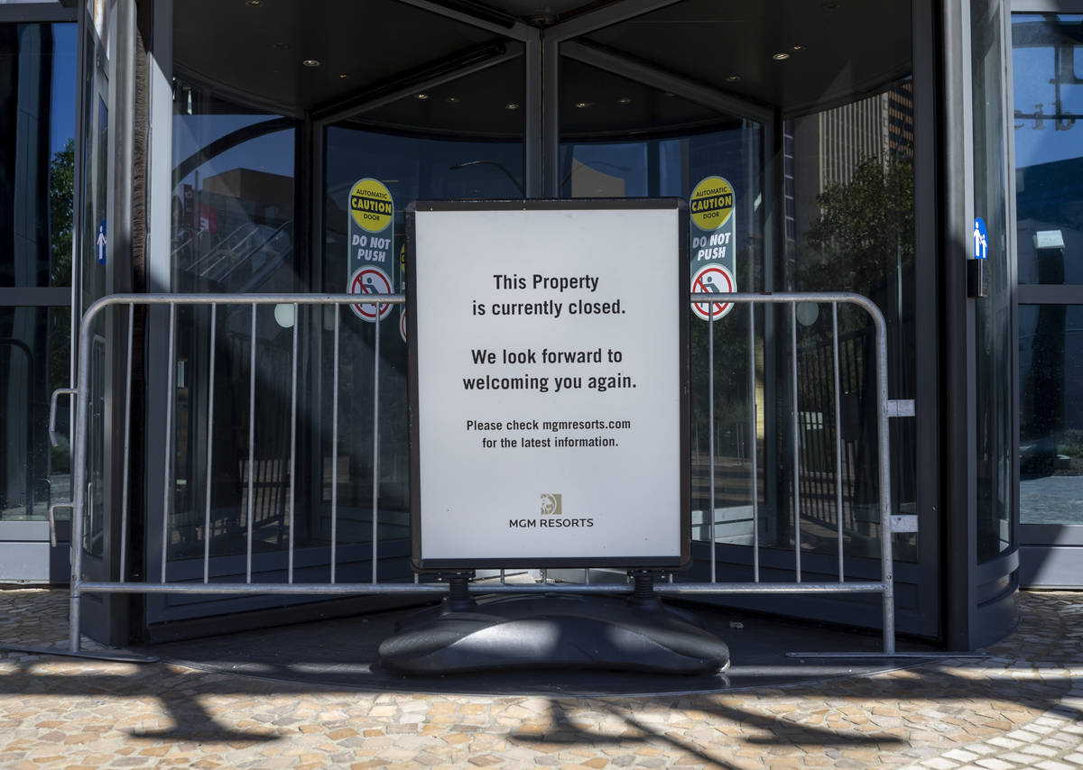 A sign stating Park MGM's temporary closure is seen along the Las Vegas Strip on Wednesday, Aug ...
