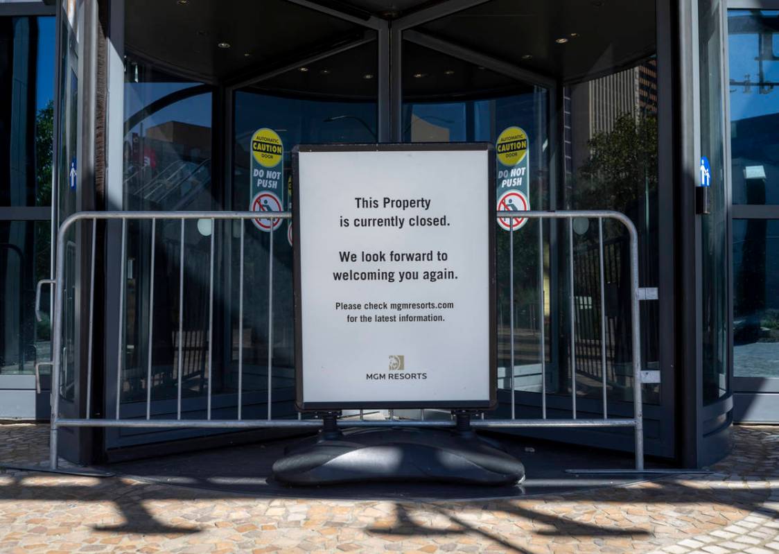 A sign stating Park MGM's temporary closure is seen along the Las Vegas Strip on Wednesday, Aug ...
