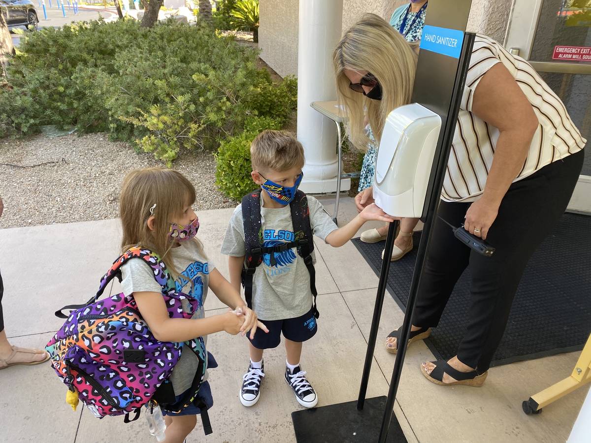 Students arrive for the first day of school Wednesday, Aug. 12, 2020 at the Dr. Miriam & Sheldo ...