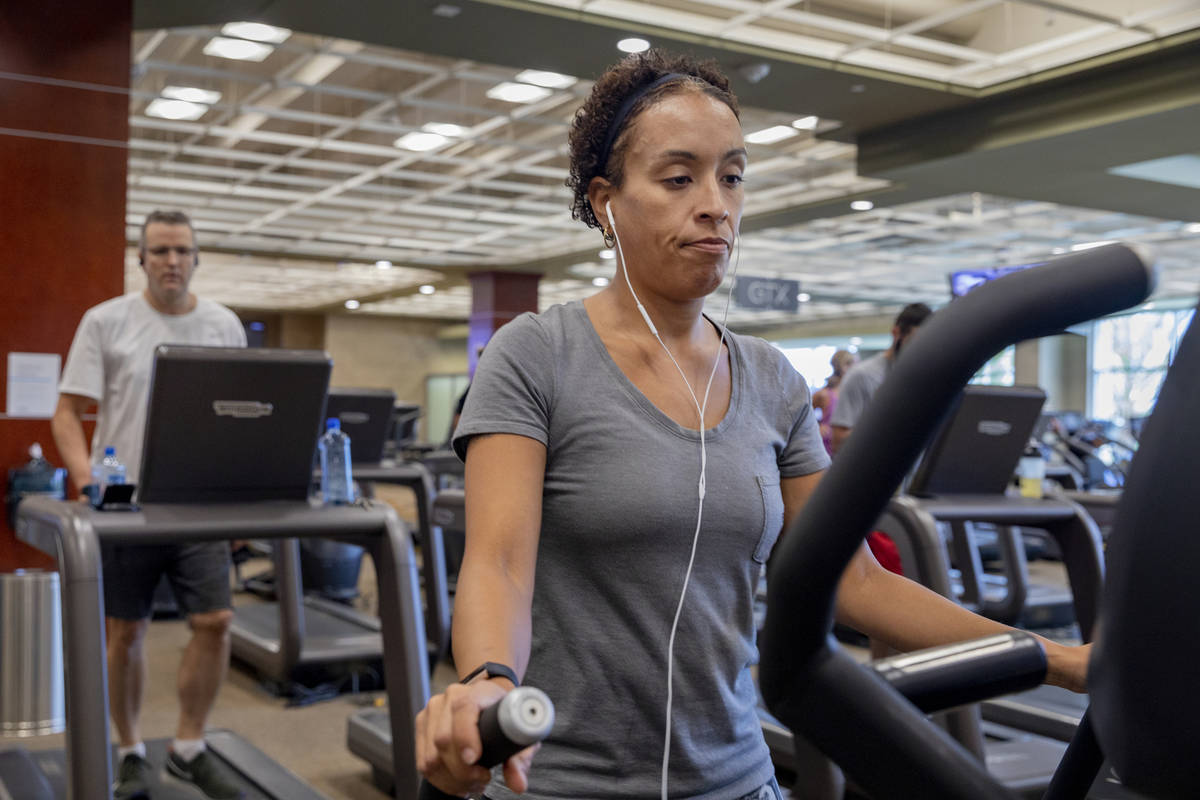 Life Time Fitness member Keri Mladenov of Las Vegas uses a treadmill at the Life Time Fitness ...