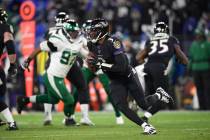 Baltimore Ravens quarterback Robert Griffin III (3) scrambles during the second half of an NFL ...