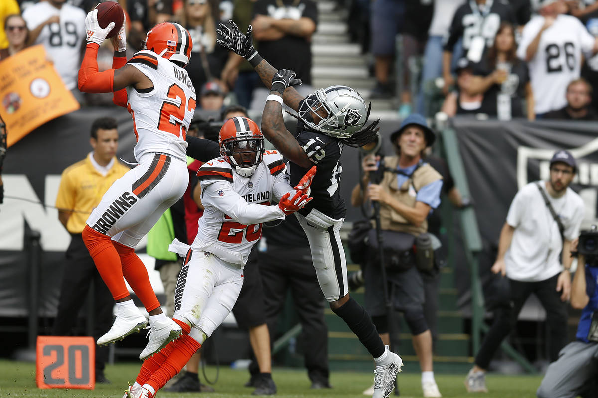Cleveland Browns strong safety Damarious Randall (23) intercepts a pass intended for Oakland Ra ...