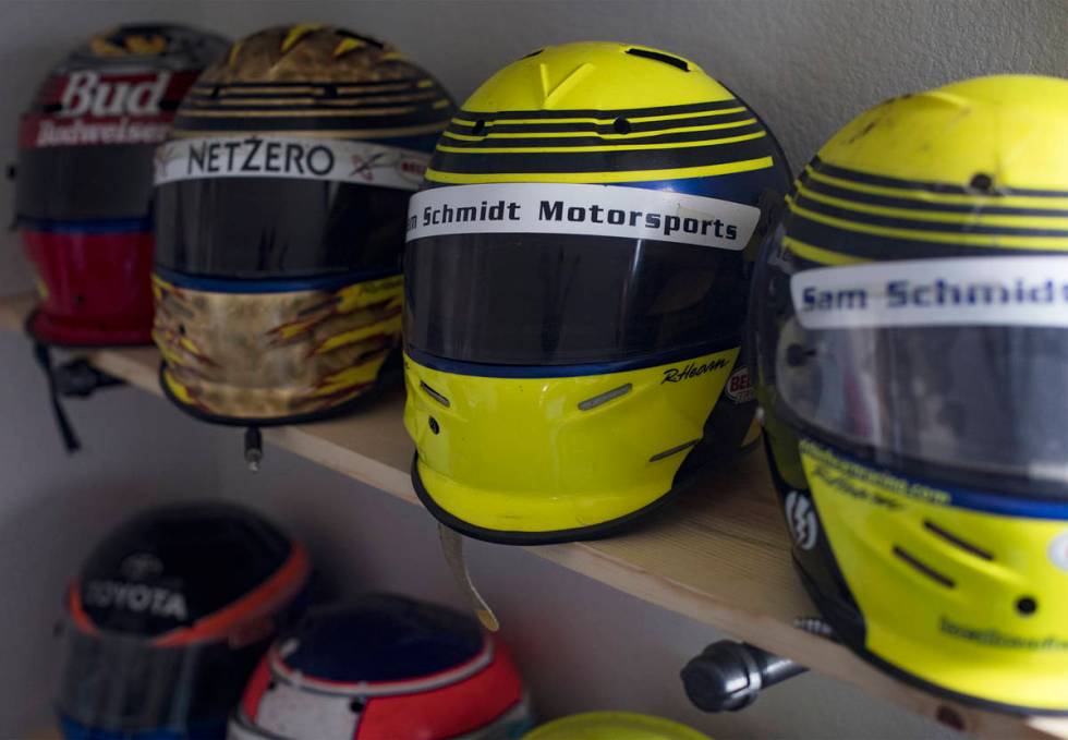 The used helmets of Richie Hearn, a former IndyCar racing driver who won the first major race a ...