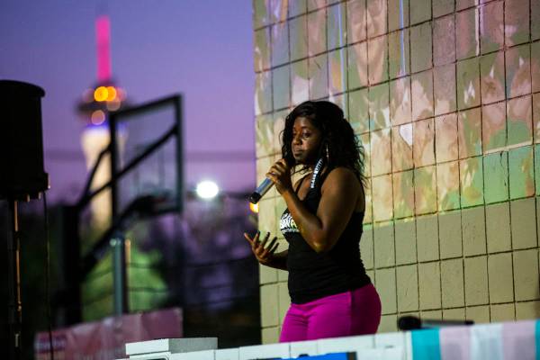 Nicole Williams, of Vegas Urban Pride, speaks during a candlelight vigil, in remembrance of the ...