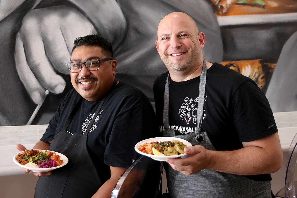 Paras Shah, left, and Jeffrey Weiss, both chefs and co-owners, at Valencian Gold in Las Vegas T ...