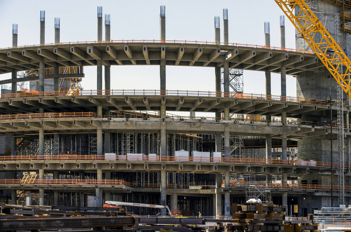 A single worker walks about the MSG Sphere at The Venetian construction site as it remains dorm ...