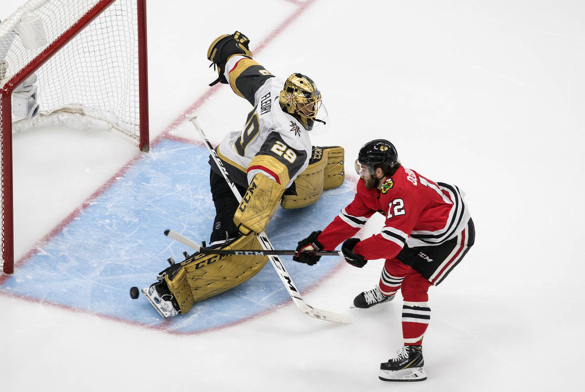 Vegas Golden Knights goalie Marc-Andre Fleury (29) makes the save on Chicago Blackhawks' Alex D ...