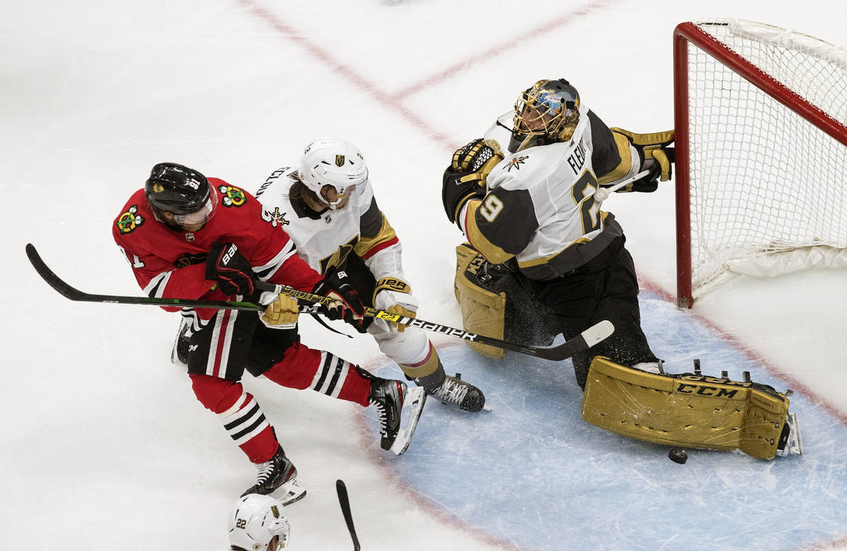 Vegas Golden Knights goalie Marc-Andre Fleury (29) makes the save on Chicago Blackhawks' Drake ...