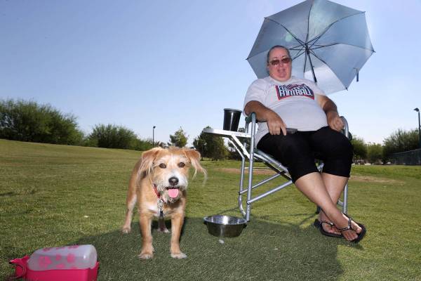 Gayle Moriner of Las Vegas with her dog Beasley, a 6-year-old terrier mix, at the Kellogg Zaher ...