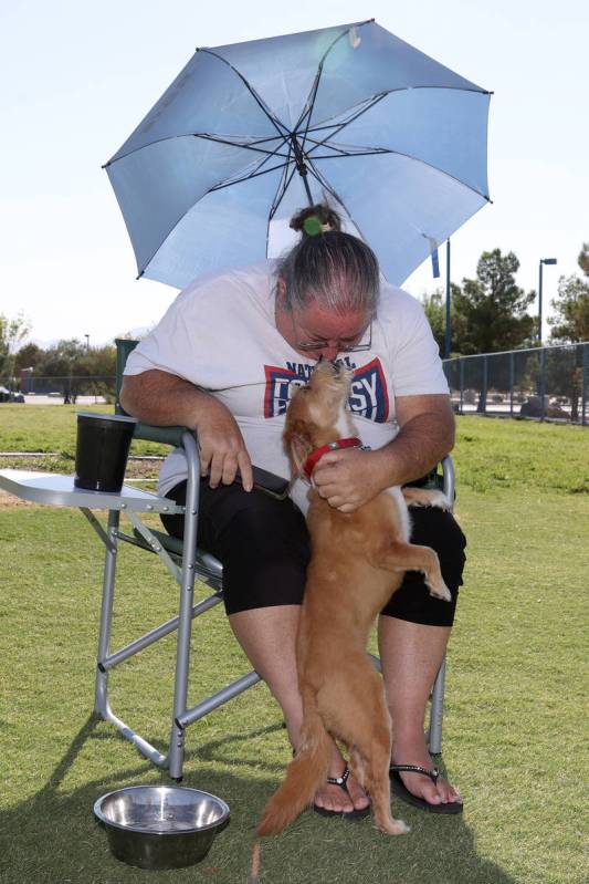 Gayle Moriner of Las Vegas with her dog Beasley, a 6-year-old terrier mix, at the Kellogg Zaher ...