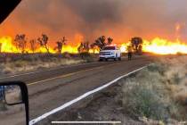A fire burns Sunday in the Mojave National Preserve in eastern California. (San Bernardino Coun ...