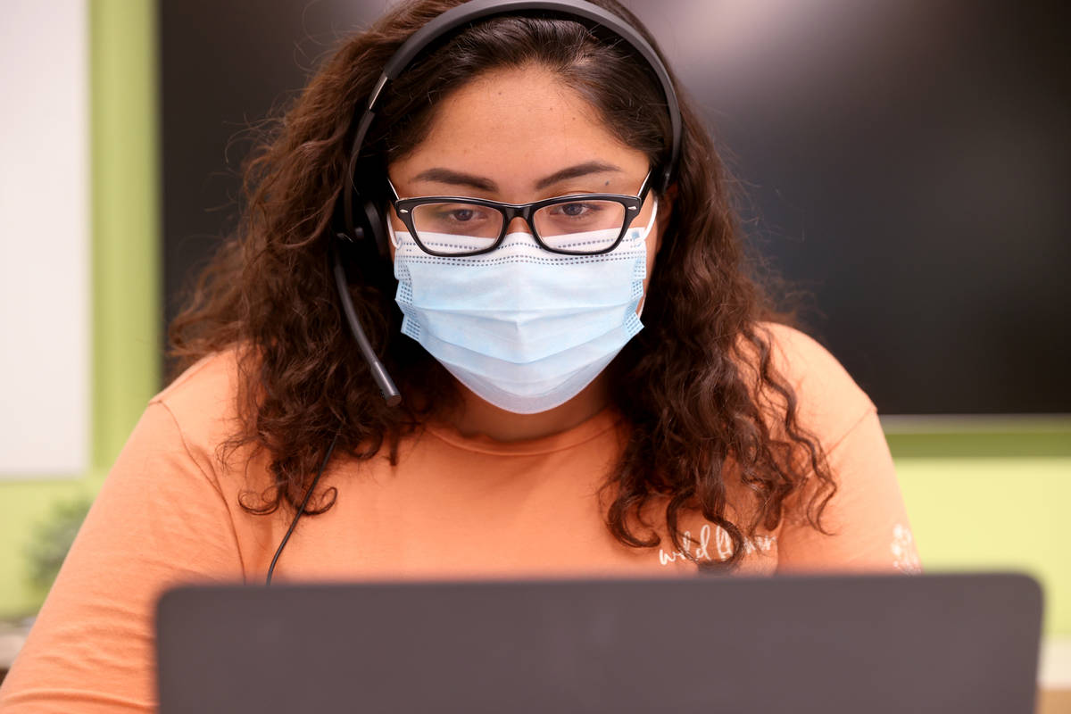 UNLV School of Public Health student Yareli Romualdo works on COVID-19 contract tracing Thursda ...