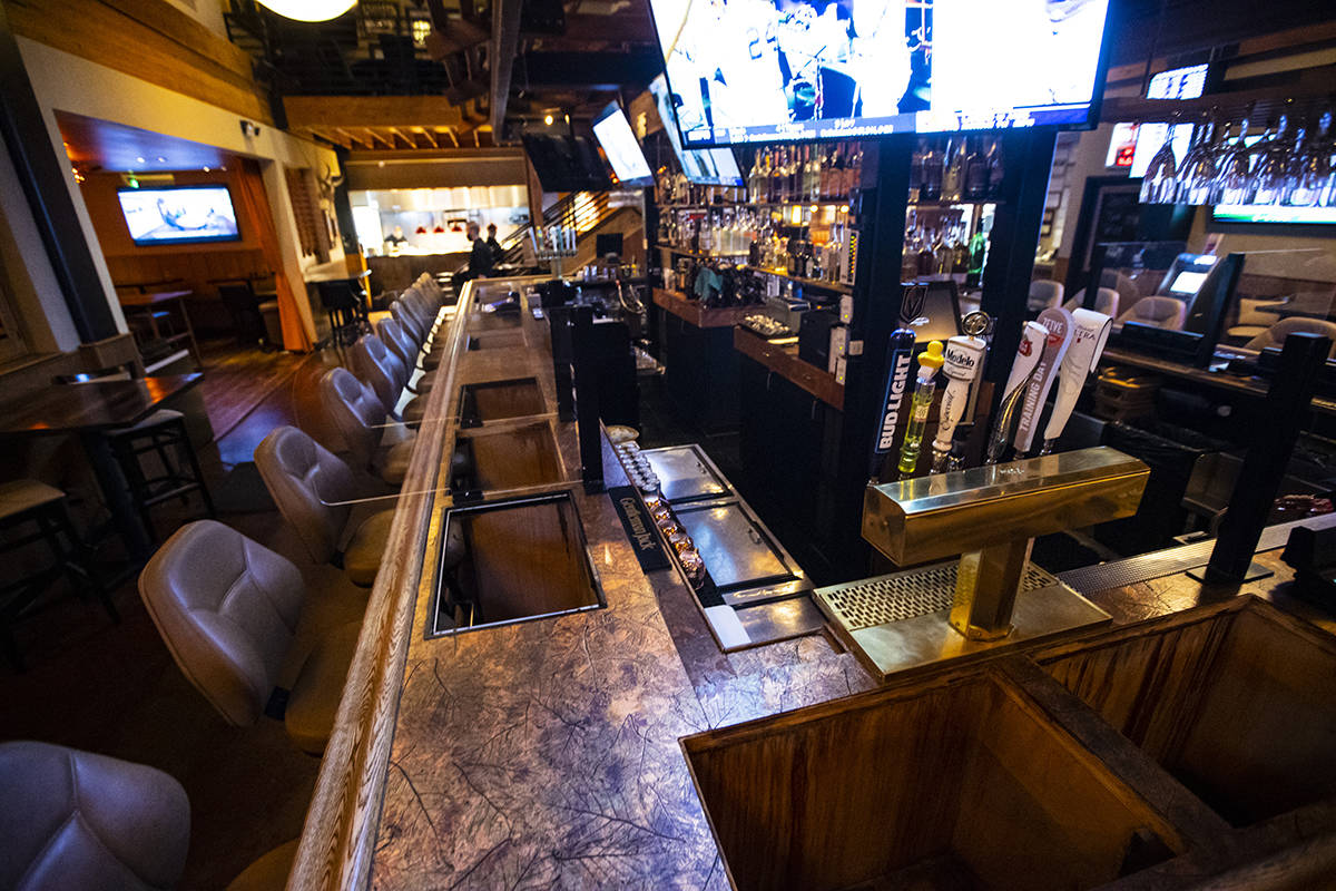 Empty spaces at the bar where bartop gaming machines formerly were at Black Mountain Grill in H ...