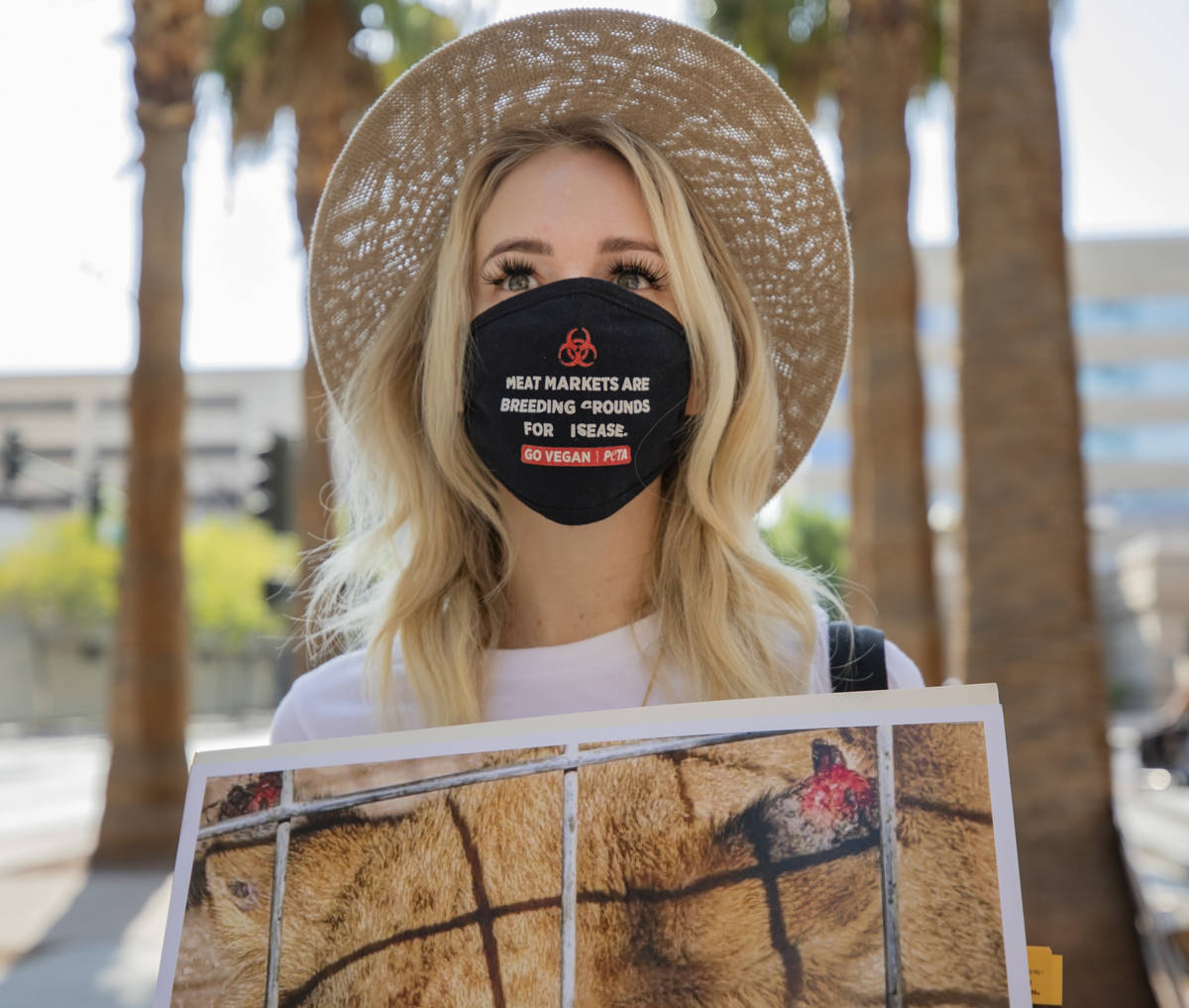 People for the Ethical Treatment of Animals activist Emily Slayter of Las Vegas protests animal ...