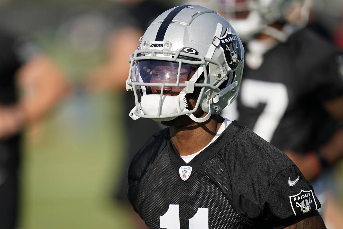 Las Vegas Raiders wide receiver Henry Ruggs III (11) attends an NFL football training camp prac ...