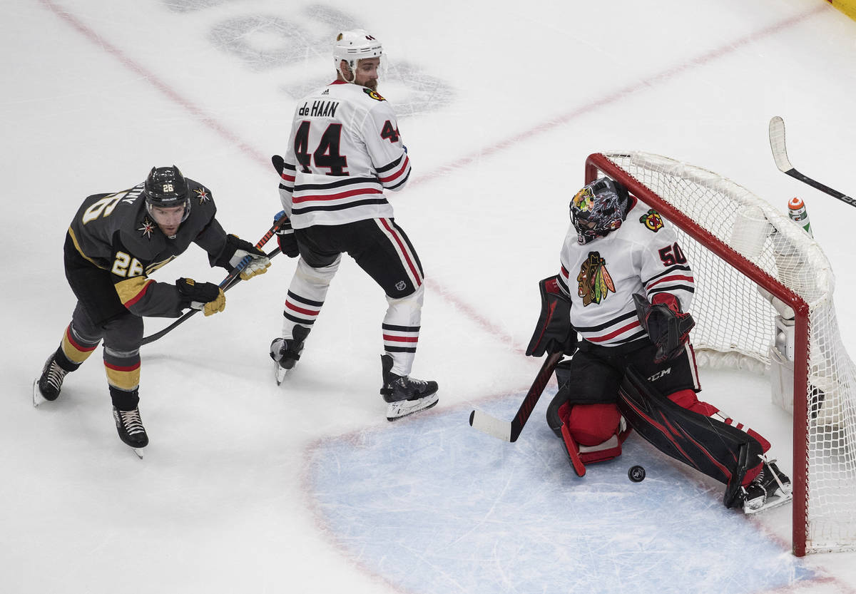 Vegas Golden Knights' Paul Stastny (26) is stopped by Chicago Blackhawks goalie Corey Crawford ...