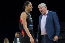 Las Vegas Aces head coach Bill Laimbeer, right, shares a laugh with Las Vegas Aces center Liz C ...